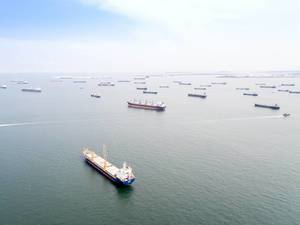 Aerial: Ships in front of Singapore