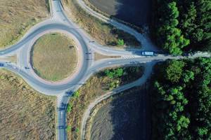 Aerial view of a suspended roundabout in Romania, Ploiesti city, top down angle