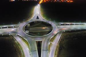 Aerial view of roundabout with drone, night time