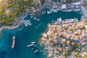 Aerial view of the harbour bay of Kouzounos, southeast of Spetses, Greece, Archipelago Saronic Islands