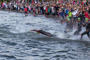 After a rolling start of the Ironman 70.3 in Lahti, north of Helsinki, the triathlon athletes are competing in a swimming race