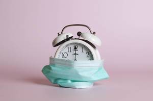 Alarm clock with safety mask