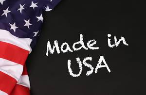 American flag with the text Made in USA against a blackboard background