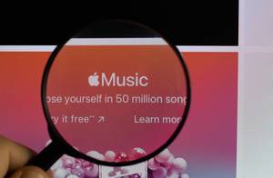 Apple Music under magnifying glass
