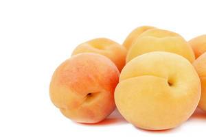 Apricots isolated above white background (Flip 2019)