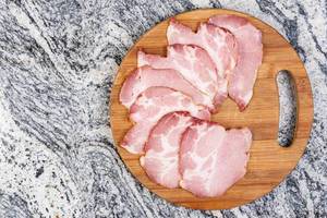Arranged Pork Dried Neck Meat on the wooden board (Flip 2019)