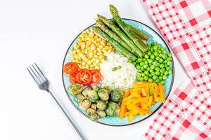 Asparagus, Brussels sprouts, corn, peppers, peas, tomato and rice, top view (Flip 2020)