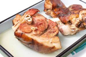 Baked delicious Pork Knuckle in baking tray