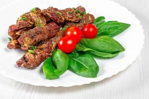 Baked lamb with spinach and cherry tomatoes (Flip 2019)