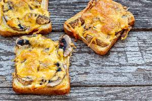 Baked sandwiches with mushrooms and cheese