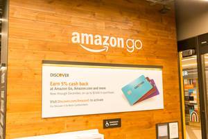 Banner with Discover it cash back promotions at the Amazon Go retail store in Chicago