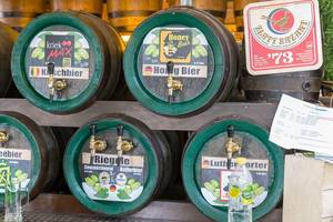 Barrels with different types of beer