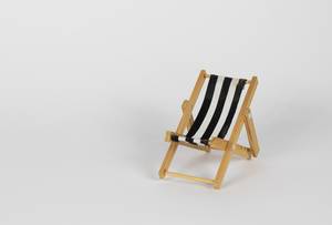 Beach chair with black and white stripes