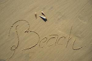 Beach written in Sand with Sea Shells in Vietnam