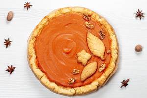 Beautiful pumpkin pie and star anise. Top view (Flip 2019)