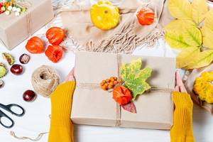 Beautifully packaged gift in autumn style in women