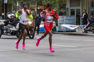 Belgian marathon runner Bashir Abdi and his training partner, British legend Sir Mo Farah, ran during much of the Chicago Marathon side by side, until Farah lost ground and ended 8th
