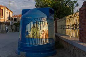 Big blue recycle bin for glass. Waste separation in Greece