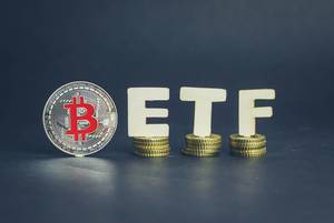 Bitcoin coin with ETF text on coins