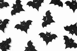 Black bats on white background for Halloween