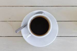 Black coffee (americano) on wooden  background  Flip 2019
