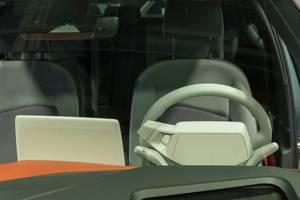 Blick in die Fahrerkabine und Innenraum des VW ID.3, mit Display hinter dem Lenkrad