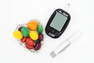 Blood glucose meter and colorful candy