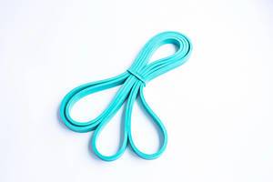 Blue resistance band on white background