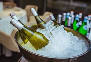 Bottles Of Wine In The Ice At The Tasting. Background, Celebration