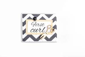 Box for the first curl of the baby on a white background