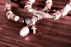 Bracelet set with a cross and "hope" plaque