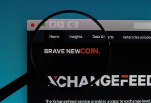 Brave new coin logo under magnifying glass