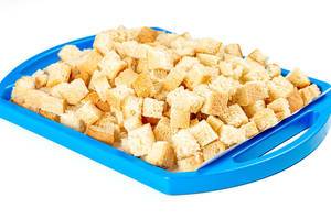 Bread crumbs on a blue tray (Flip 2020)