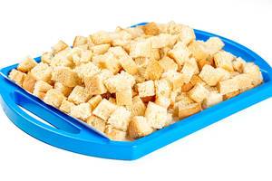 Bread crumbs on a blue tray