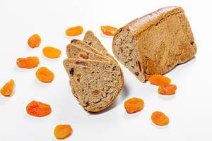 Bread with dried apricots on a white background (Flip 2019)