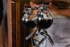 Brewed coffee inside glass bottles