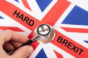 British flag with Hard Brexit text and stethoscope