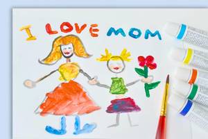 Brush and Paint on a Child Painting saying I Love Mom