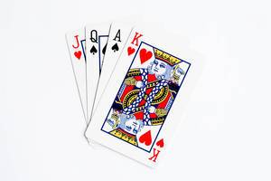 Bube, Dame, König, Ass, Spielkarten auf weißem Hintergrund
