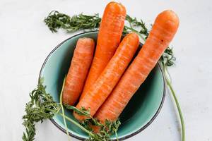 Bunch carrots in bowl