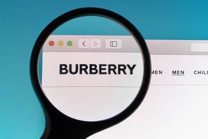 Burberry logo under magnifying glass