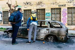 Burned down car in Athens