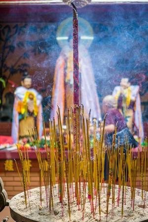 Burning Dry Incense Sticks in On Lang Pagoda in Ho Chi Minh City