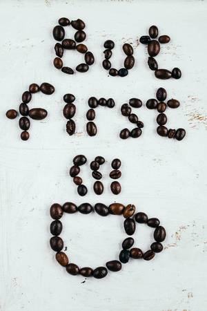 But First Coffee written with coffee beans