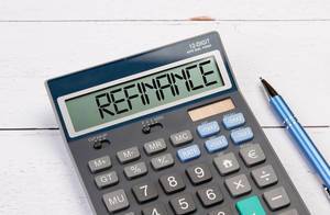 Calculator with the word Refinance on the display