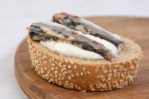 Canned-Sardines-Fish-sandwich-on-the-wooden-board.jpg
