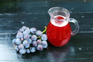 Carafe of fresh grape juice