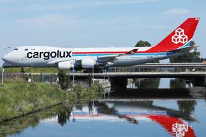 Cargolux jumbo taxiing on the bridge at Amsterdam Airport AMS