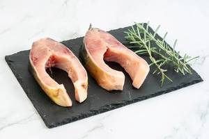Carp Fish slices with Rosemary branches