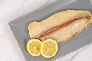 Catfish-meat-with-Lemon-served-on-the-plate.jpg